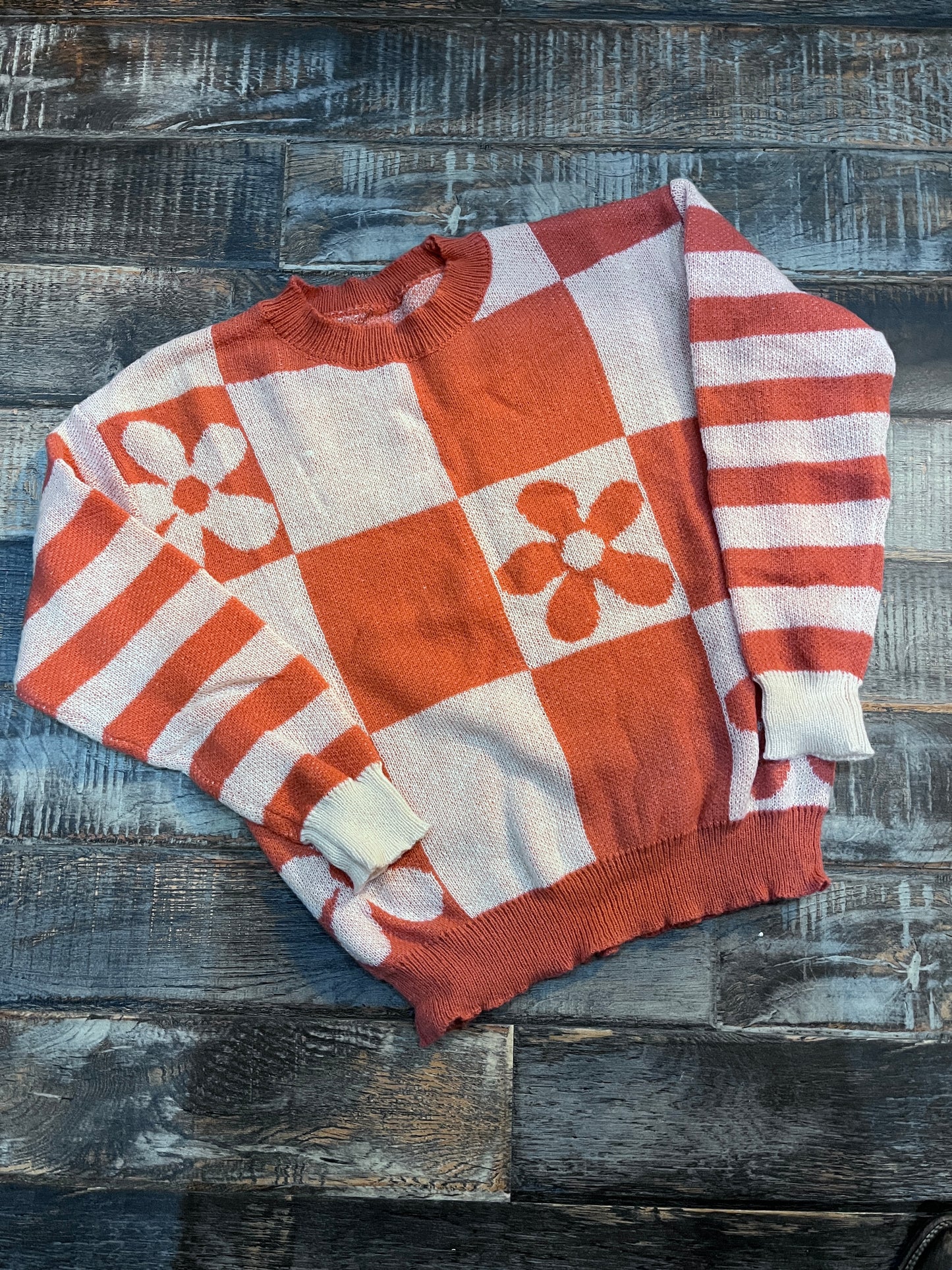 ORANGE AND WHITE FLOWER SWEATER