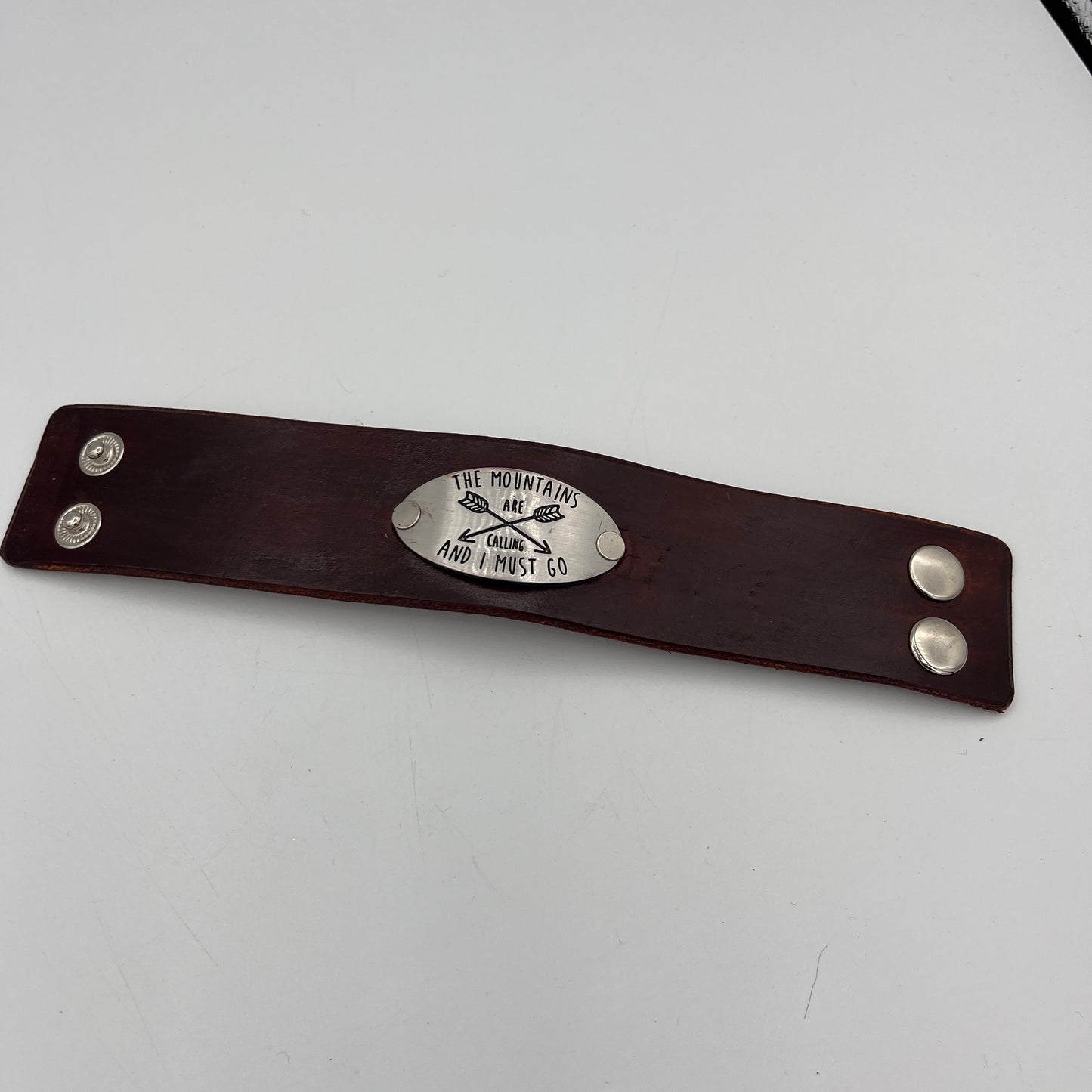 CUSTOM HANDMADE MADE LEATHER CUFF "MOUNTAINS ARE CALLING AND I MUST GO"