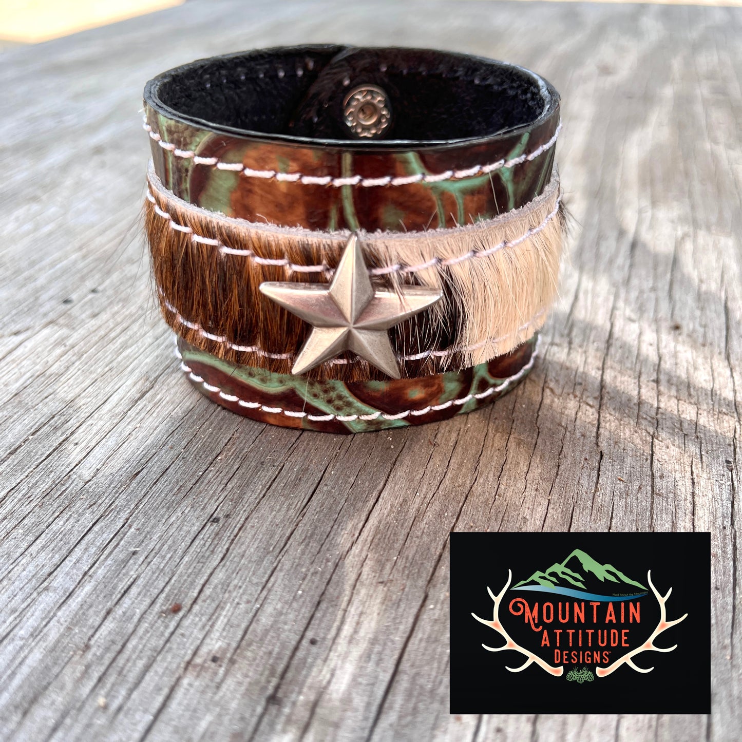 CUSTOM HANDMADE LEATHER EMBOSSED COWHIDE CUFF WITH STAR CONCHO