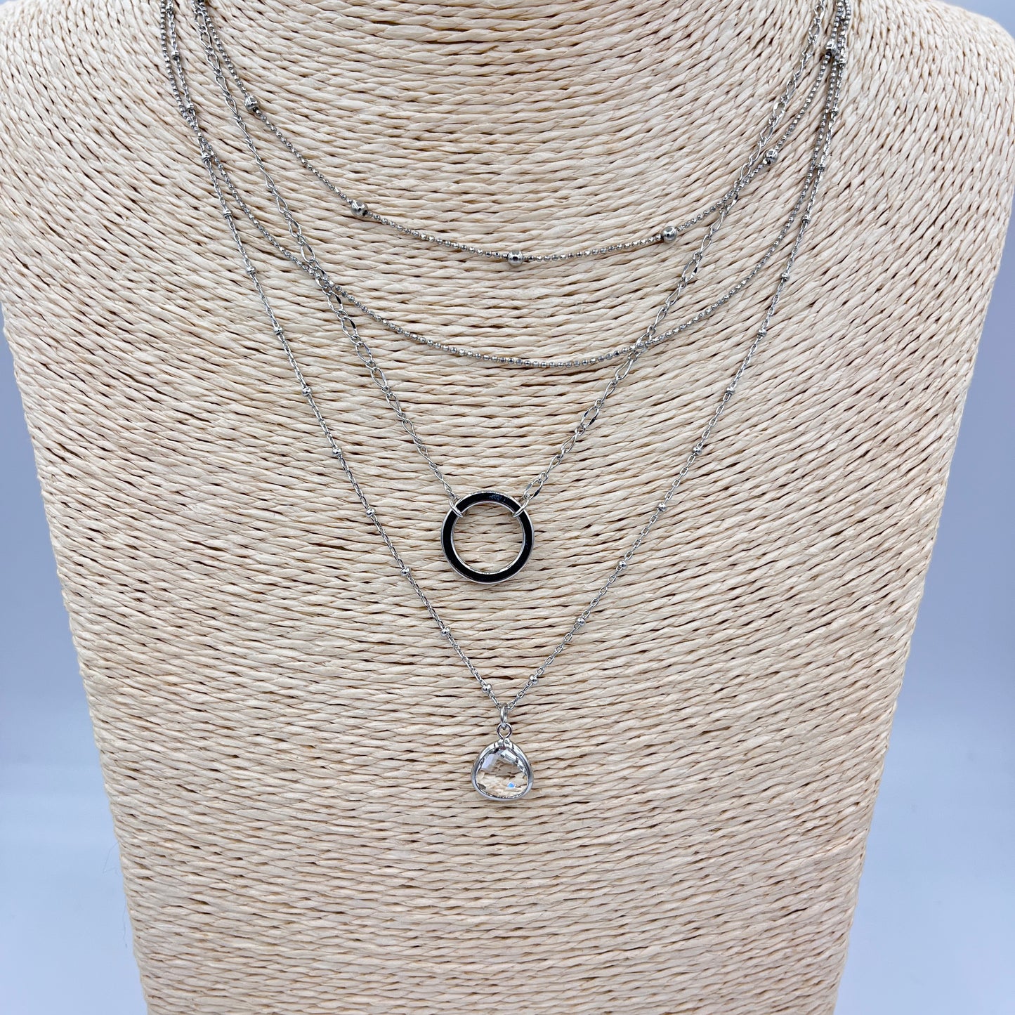 SILVER 4 LAYERED NECKLACE WITH CRYSTAL PENDANT & CIRCLE PAVER