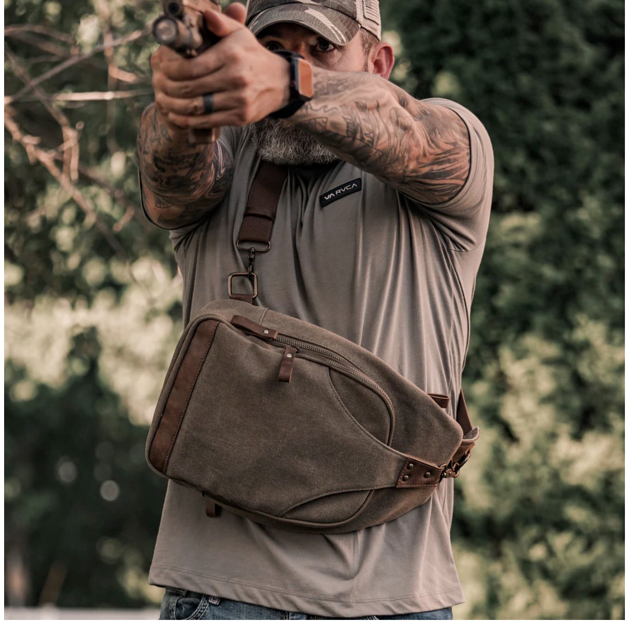 GLACIER CANVAS SLING SHOULDER CONCEALED BACKPACK by JESSIE JAMES